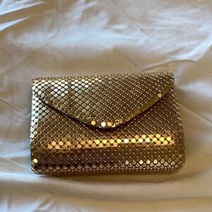 Purse gold evening couch.
